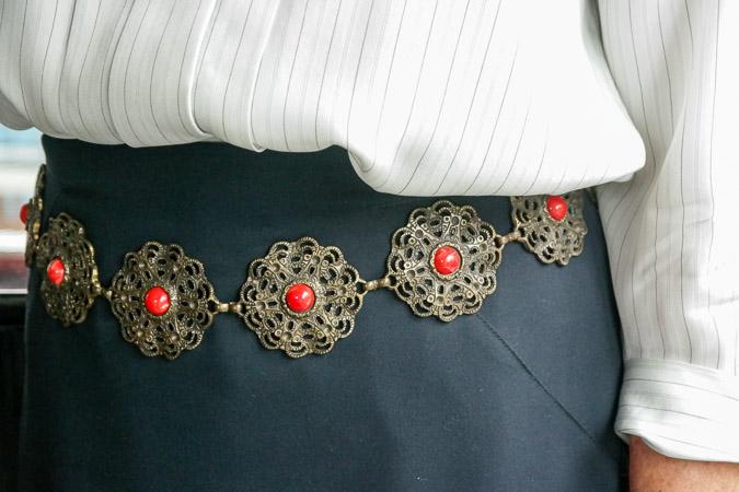 metal belt with red dots