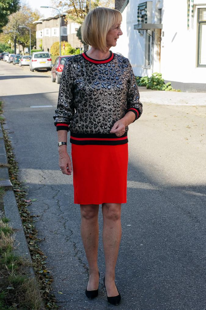 Sequined top with red pencil skirt