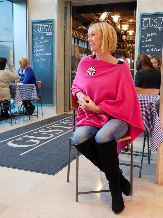 Poncho by Hope, brooch by the Citizen Rosebud
