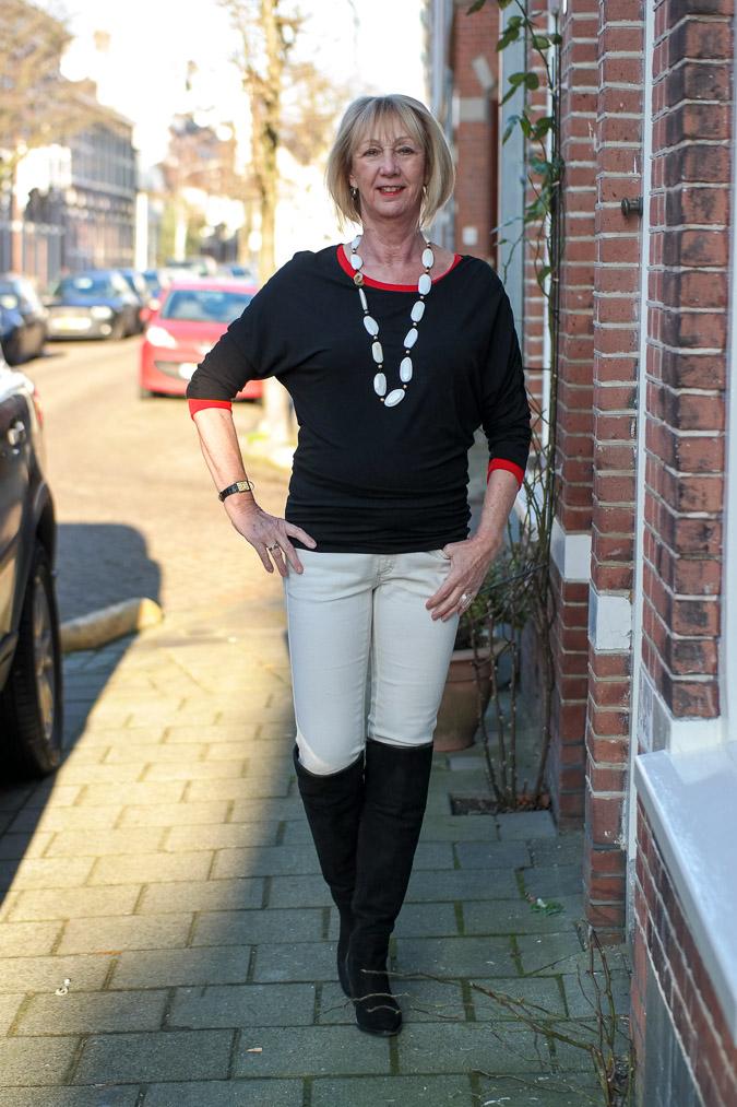 Black, cream and red outfit with OTK boots