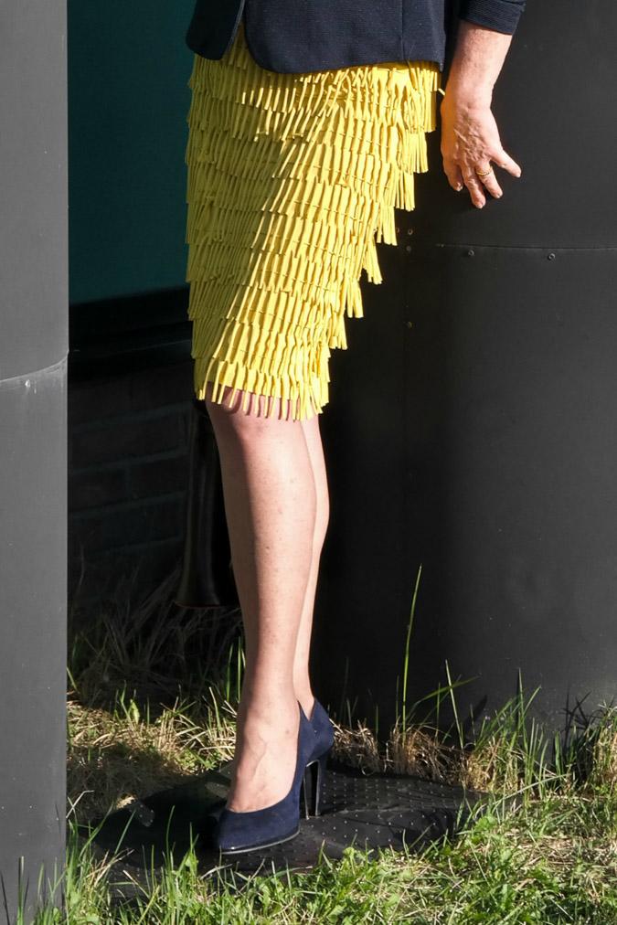 swinging yellow skirt