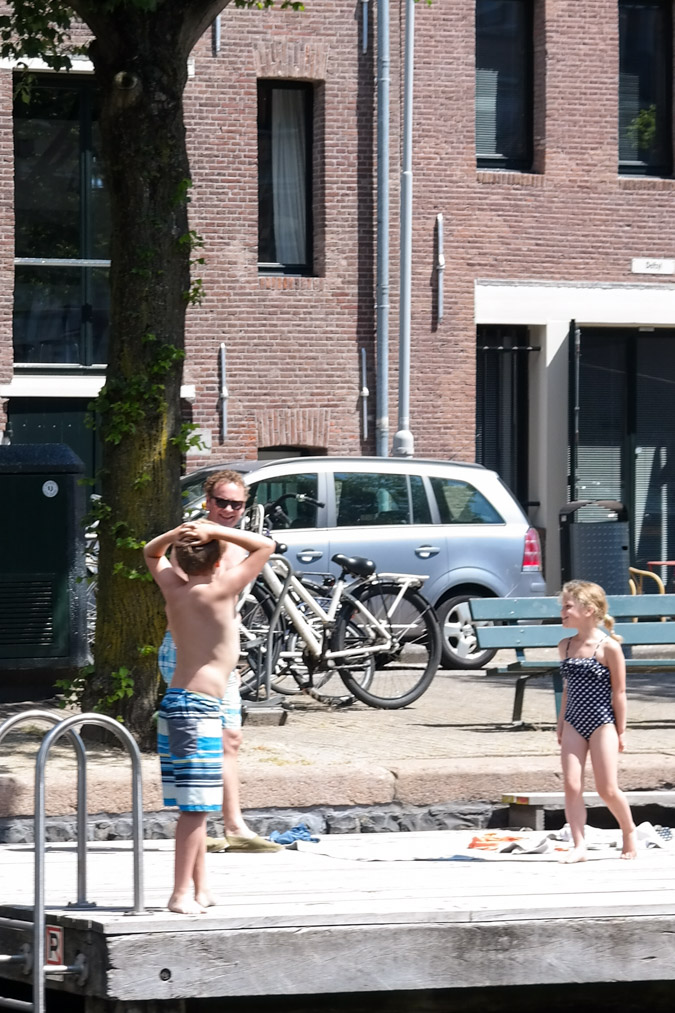 Cruising by boat through Amsterdam