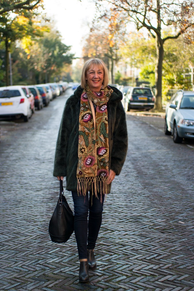Red sweater and a green faux fur coat