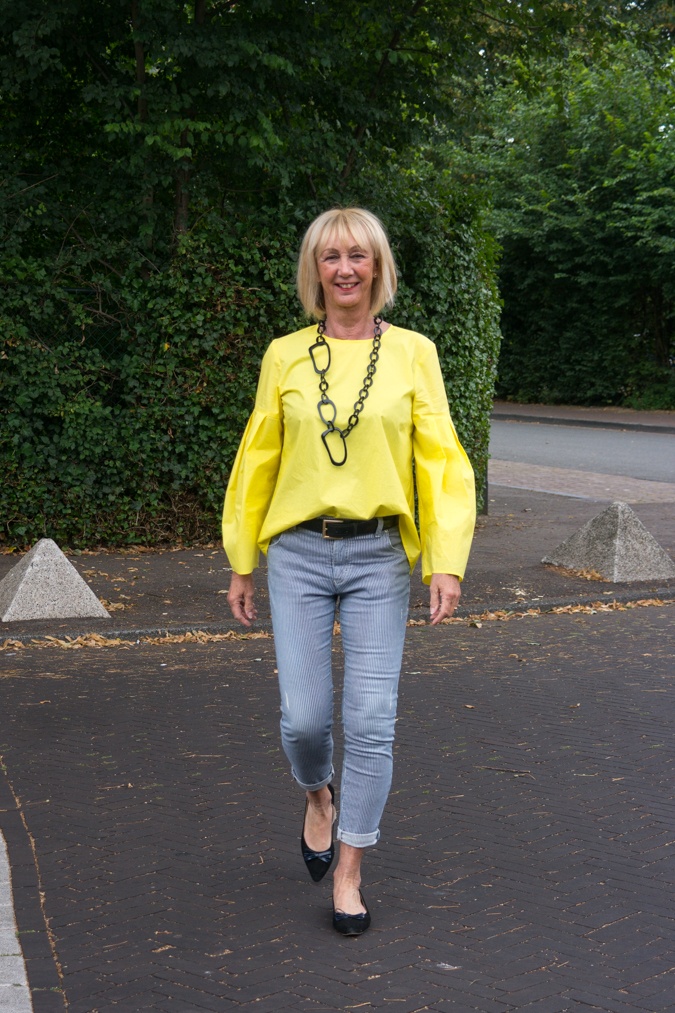 Bright yellow top with bell sleeves