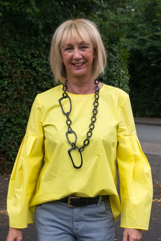 Bright yellow top with bell sleeves