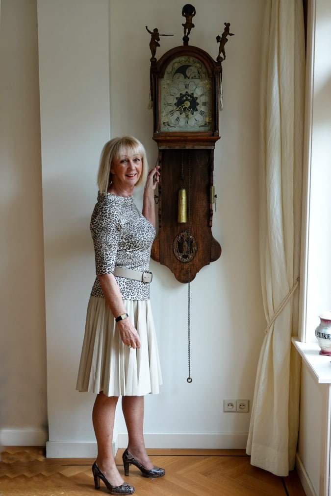 Leopard print top with cream pleated skirt