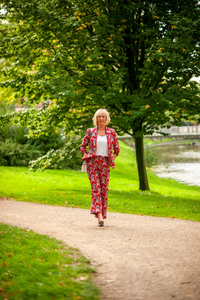 Red trouser suit