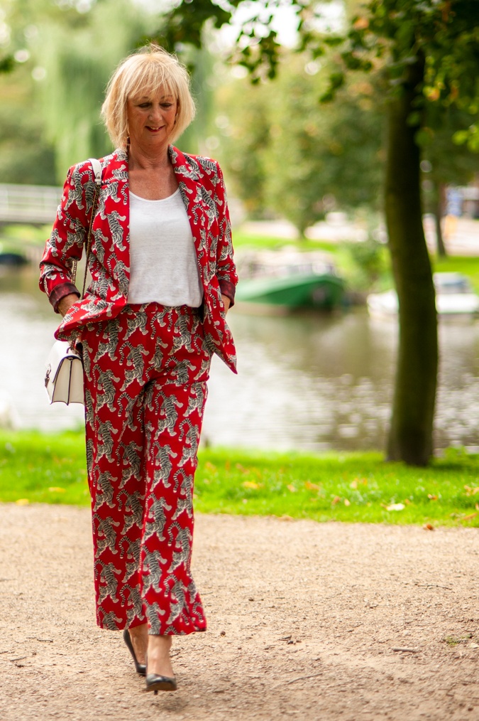 Red trouser suit