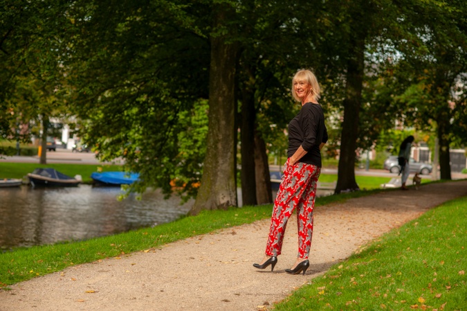 Red trousers with tigers and black top