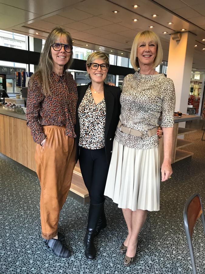 Leopard print top with cream pleated skirt