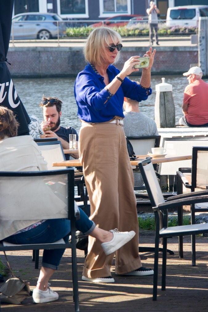 Khaki trousers and blue shirt