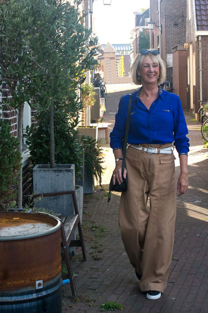 Khaki trousers and blue shirt