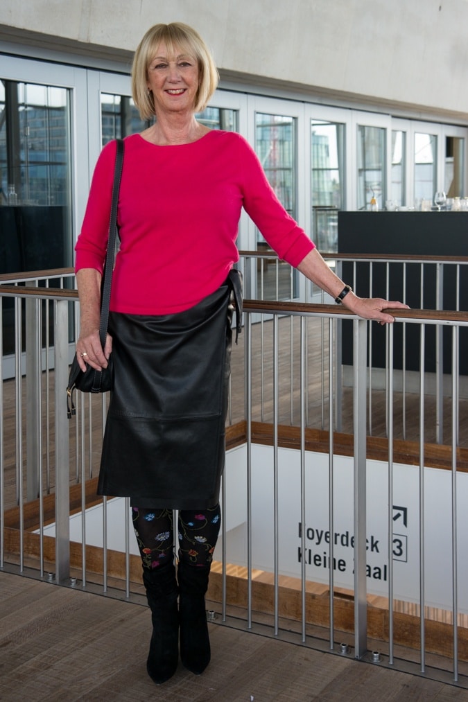 Floral tights and a black leather skirt
