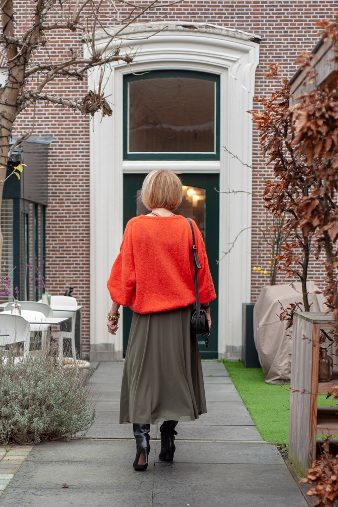 Long green skirt with orange jumper