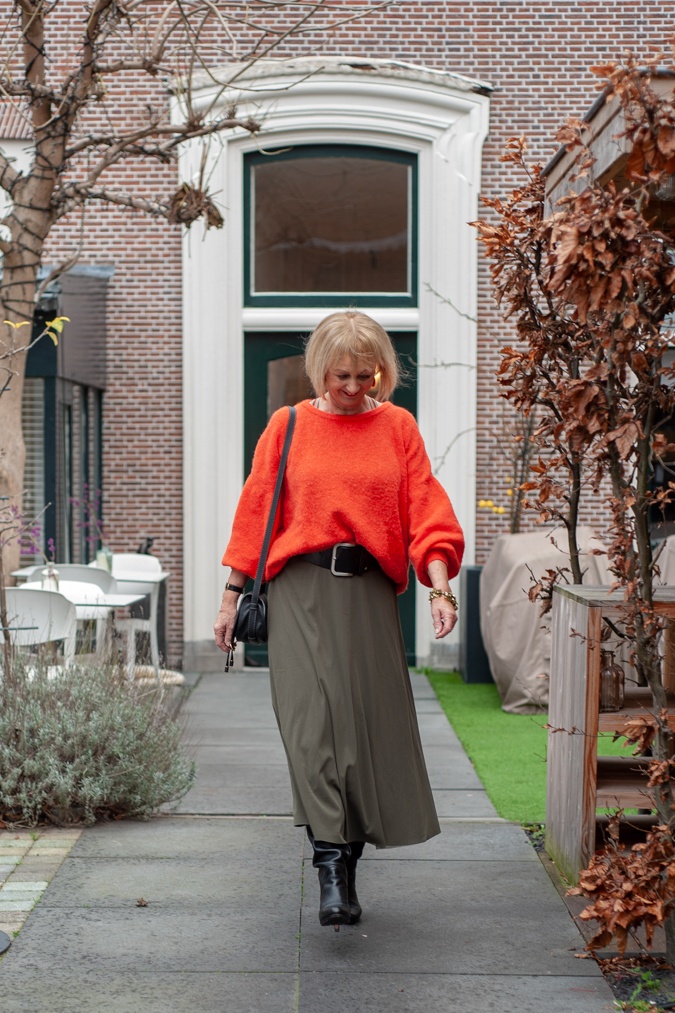 Long green skirt with orange jumper