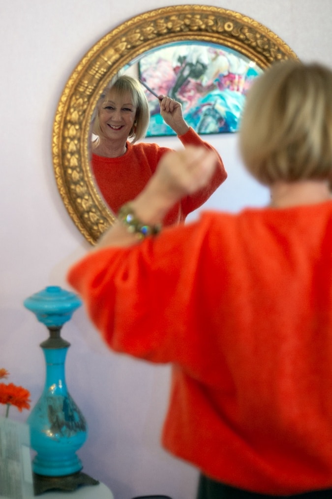 Orange jumper in mirror