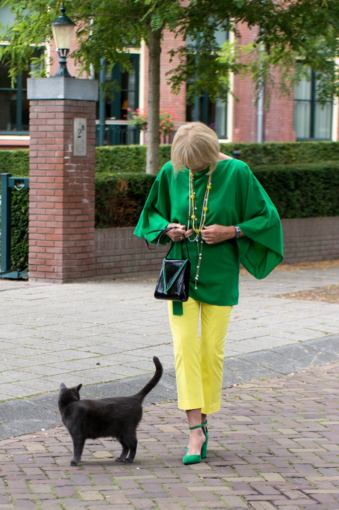 Lemon yellow trousers with a green kimono top