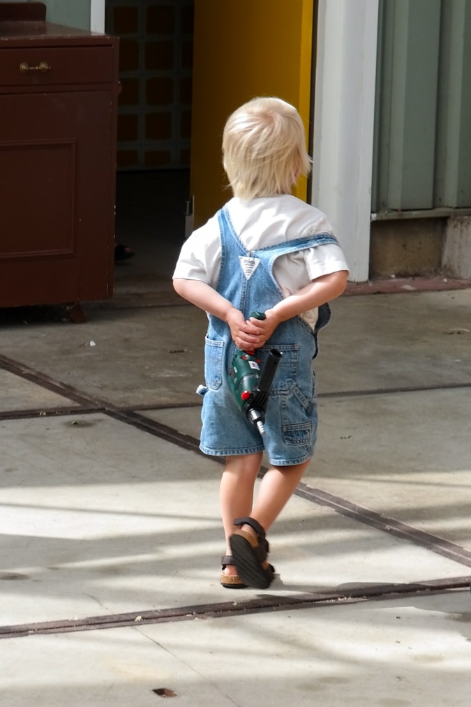 toddler with tool
