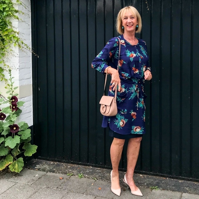 Blue floral Max Mara dress with blush pink mini bag