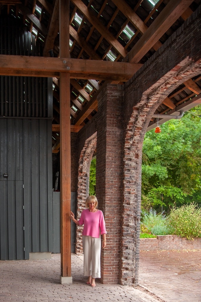 cream trousers and pink jumper