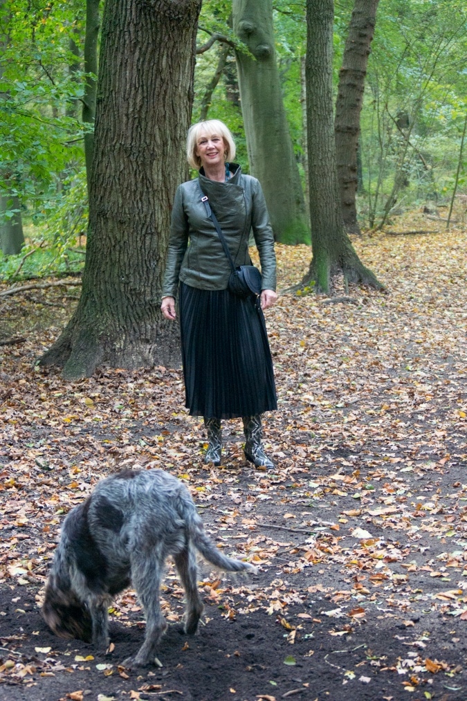 Python boots with a black pleated skirt
