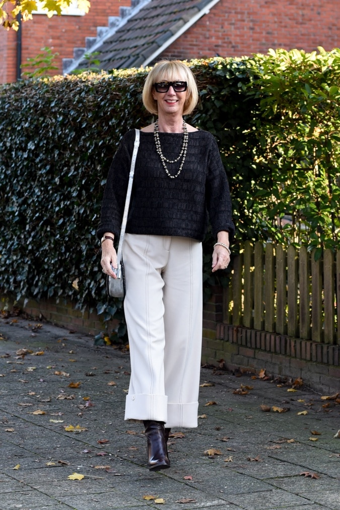 Cream trousers with brown jumper