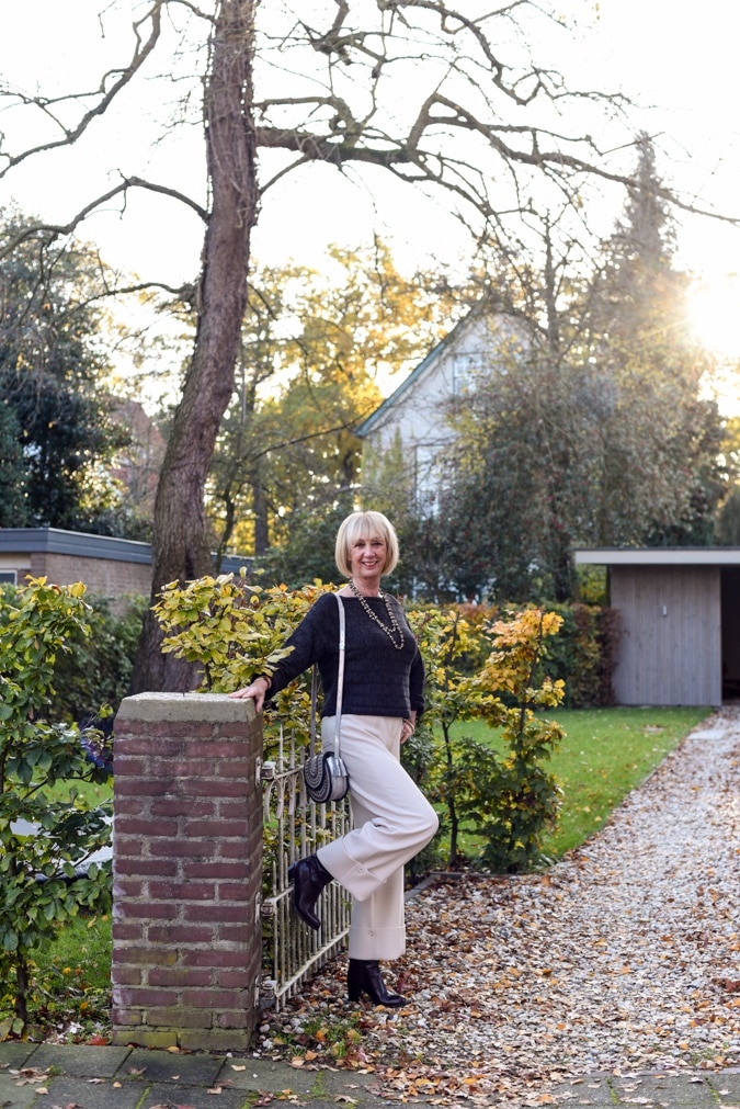 Cream trousers with brown jumper