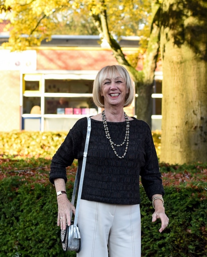 Cream trousers with brown jumper