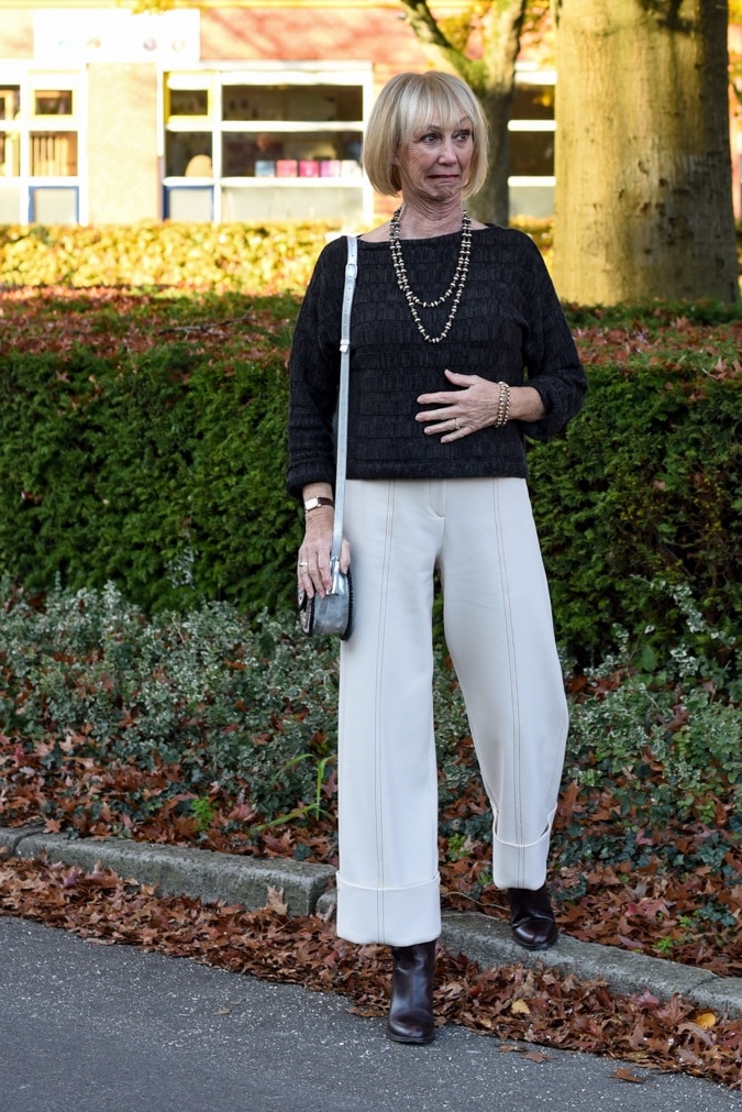 Cream trousers with brown jumper