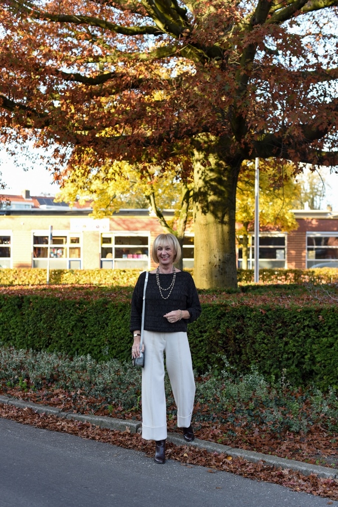 Cream trousers with brown jumper