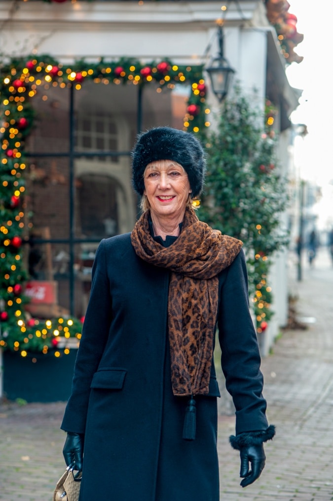 Black Max Mara coat and faux fur hat