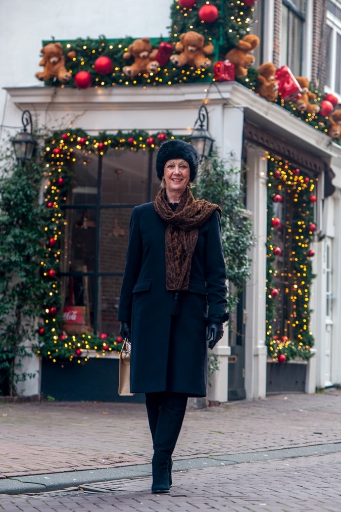 Black Max Mara coat and faux fur hat