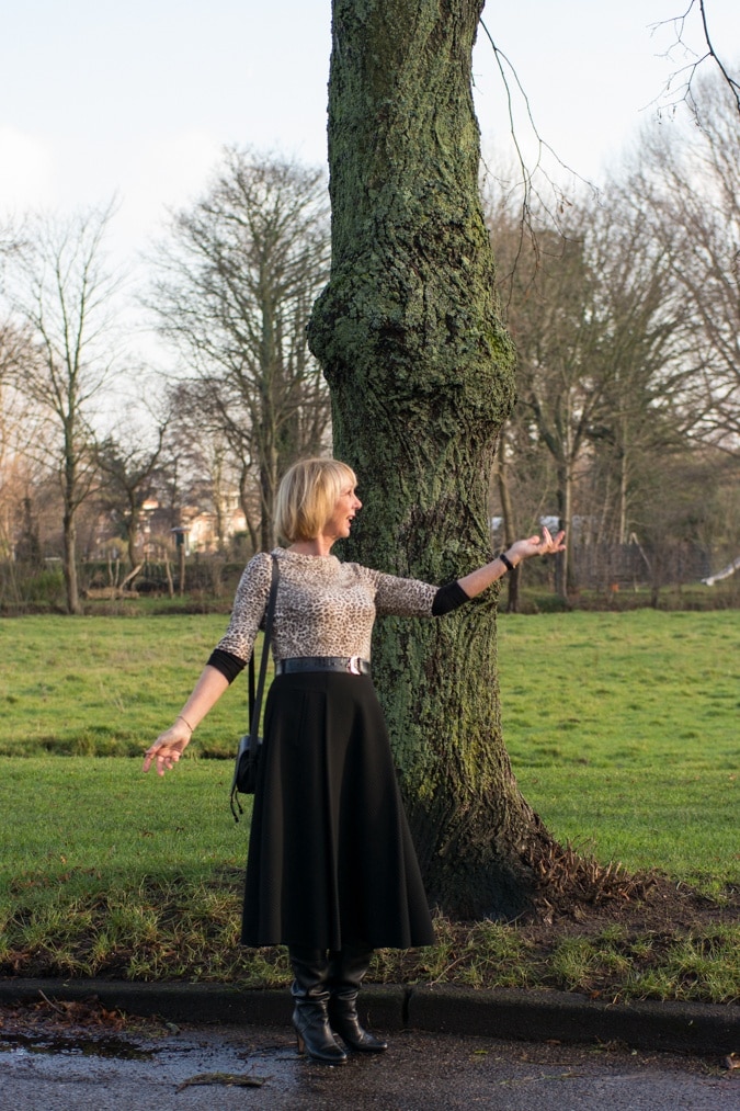 wide black skirt with leopard print top