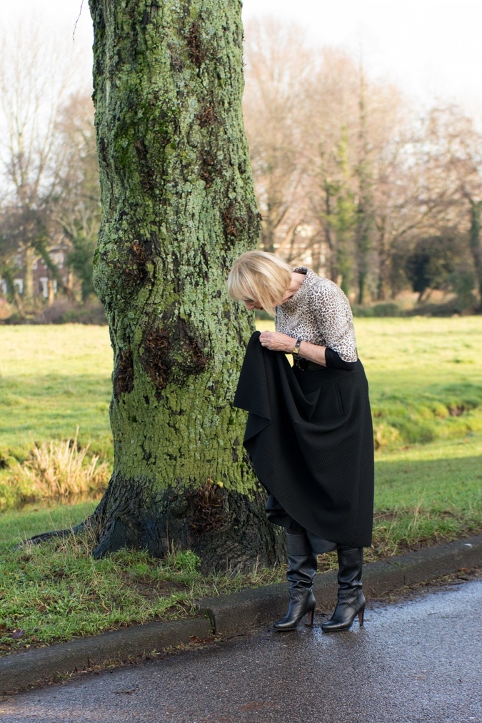 wide black skirt with leopard print top