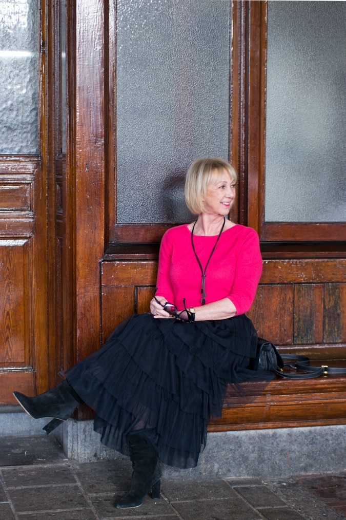 Tiered ruffle skirt with bright pink jumper