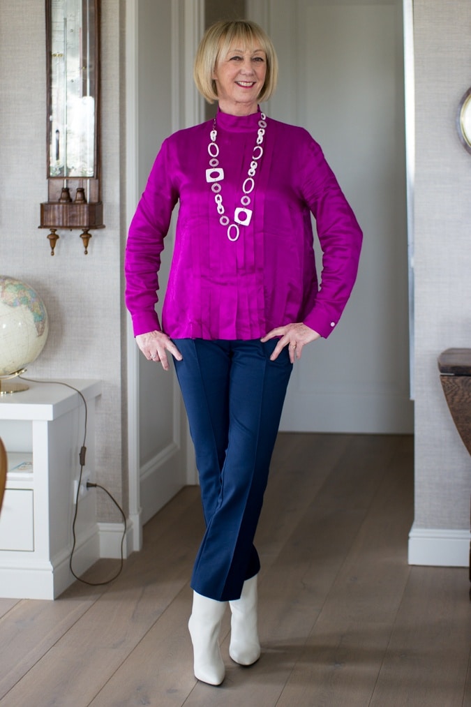 Birght purple blouse on 7/8 blue trousers