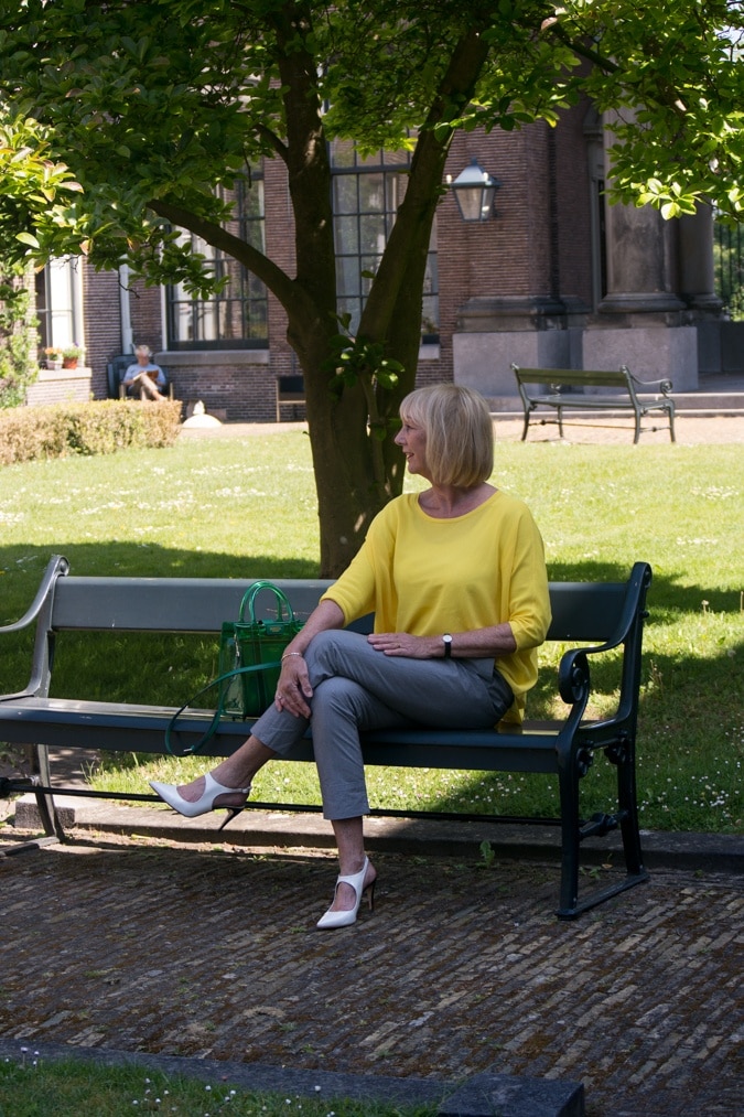 Grey trousers with a yellow jumper