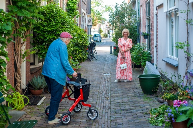 Pink and orange maxi dress and Leny van Schaik