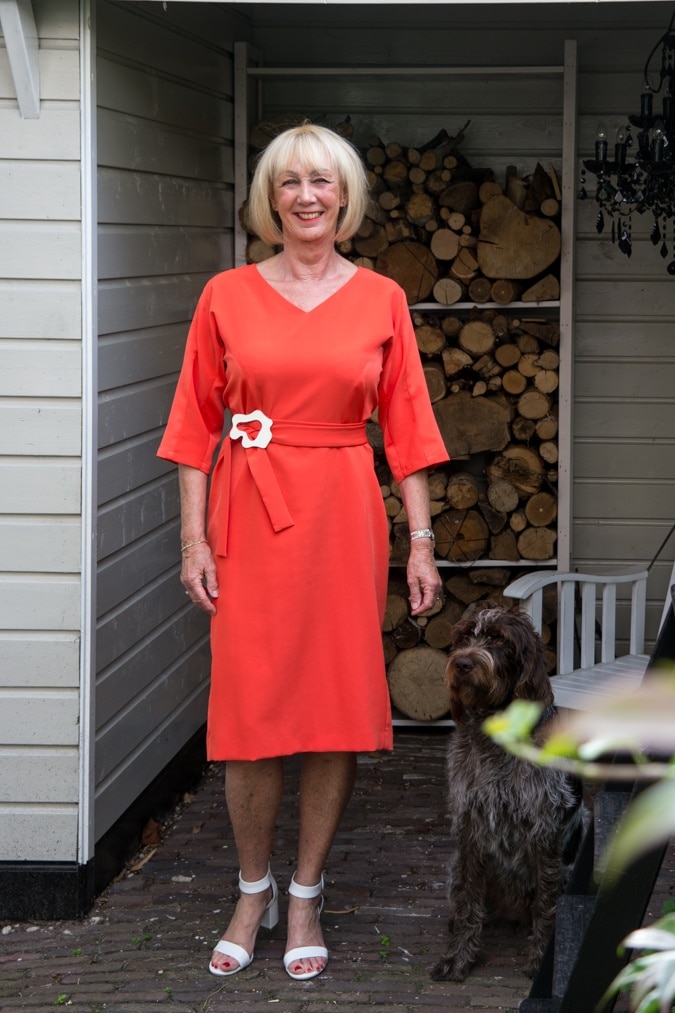 Orange dress and white block heeled sandals