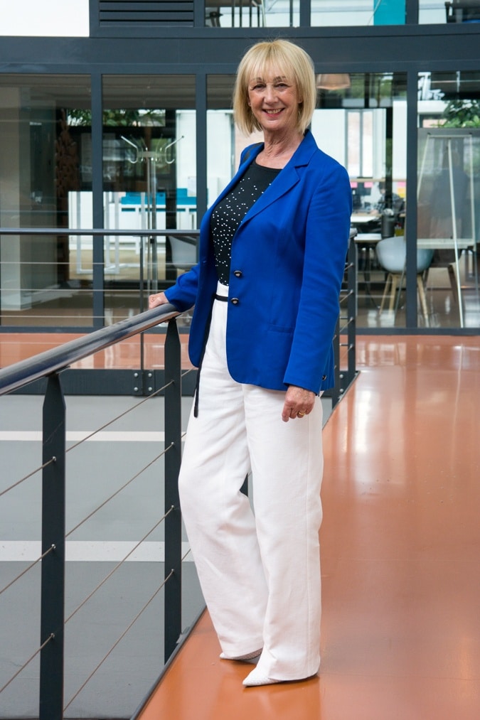 Bright blue jacket with white trousers