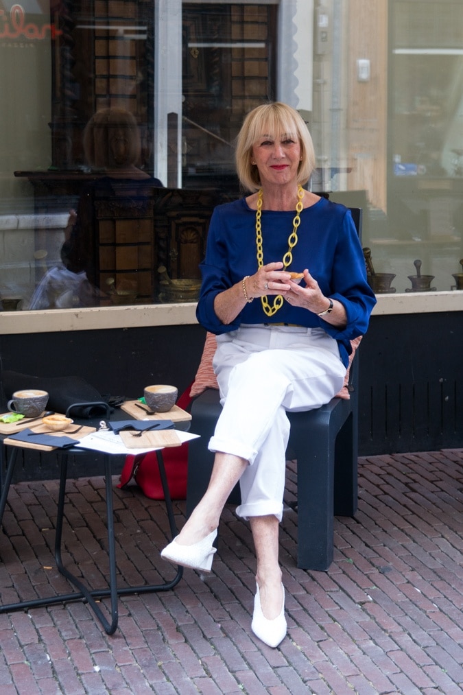 White trousers with a blue top