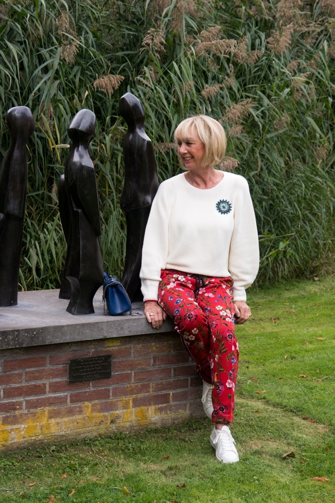 Floral red trousers with side stripe