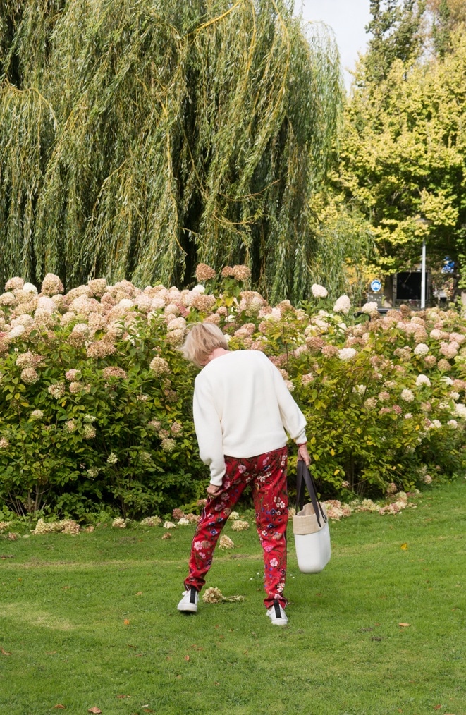 Floral red trousers with side stripe
