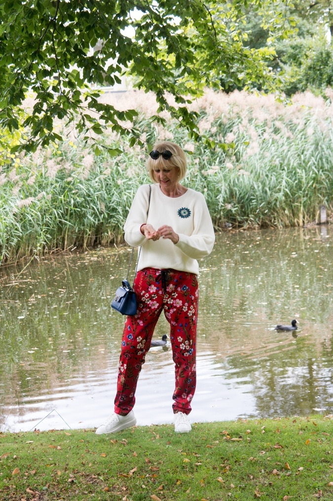 Floral red trousers with side stripe