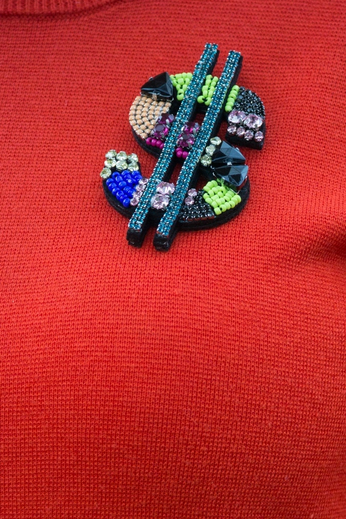 Dollar sign brooch Essentiel