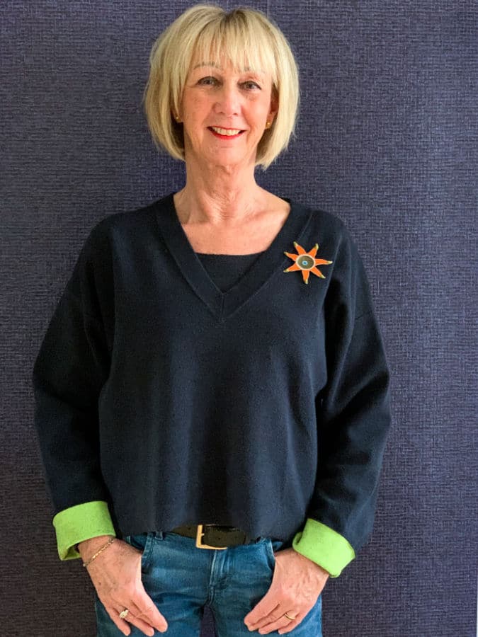 Orange brooch by Sylvia Blickman