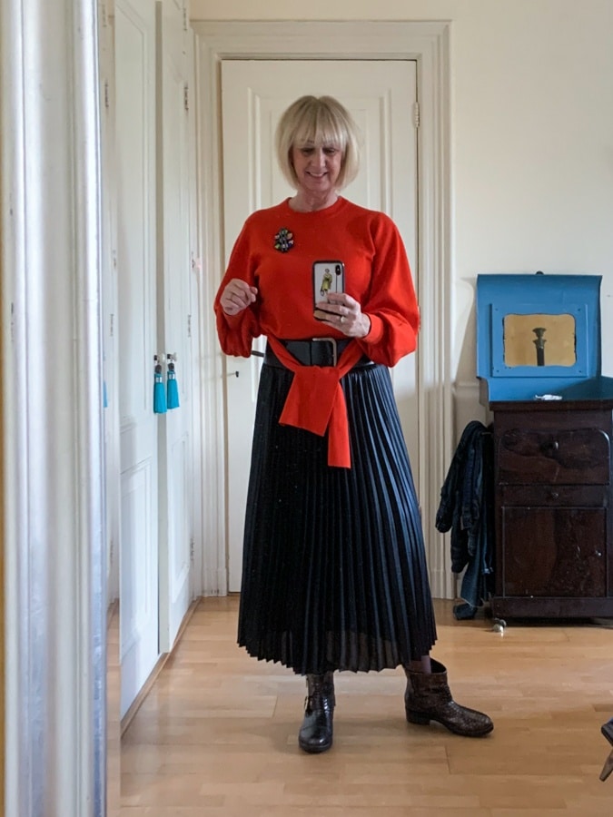 Red jumper with flaps knotted
