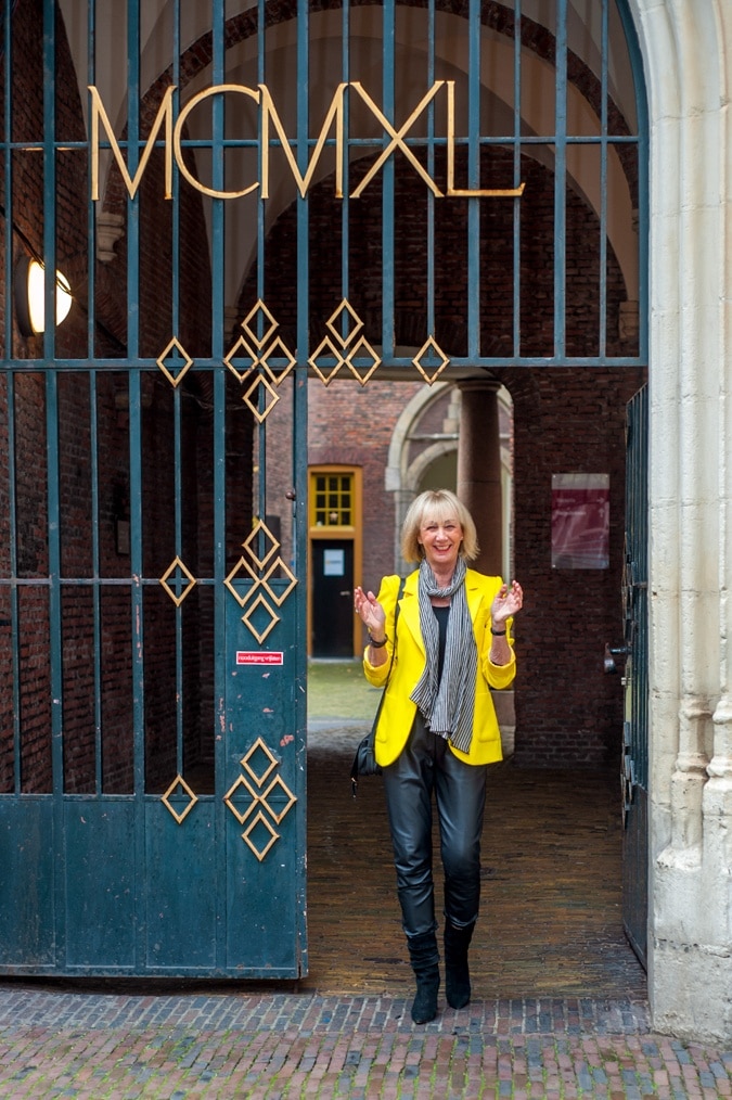 Yellow jacket with black leather trousers