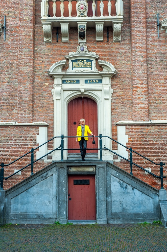 A yellow jacket with black leather trousers