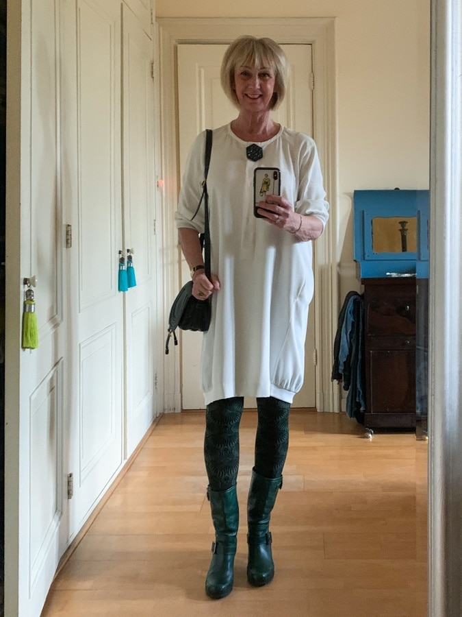 White dress with green tights and boots